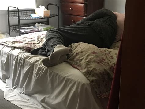 My mom sleeping. Just have the urge to take her socks and smell her