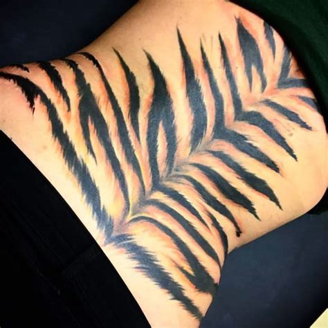 Pin on Warrior in 2024 | Tiger stripe tattoo, Stripe tattoo, Tiger ...
