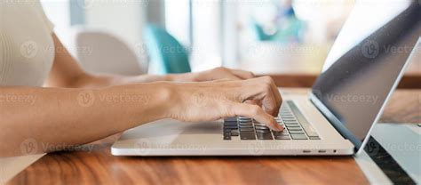 woman using laptop, freelance woman typing keyboard computer notebook