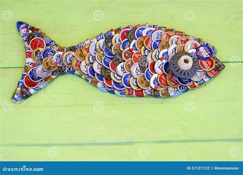 Fish Shape from Beer Bottle Caps Editorial Photography - Image of ...