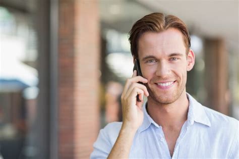premium photo  happy smiling man calling