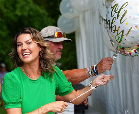 Amanda Balionis rocks a denim jumpsuit as she celebrates the debut of