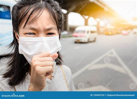 asian  child girl suffer  cough  face mask protection