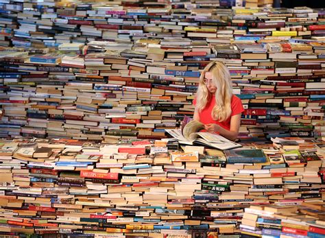 10 Signs You're A Bibliophile, Because So What If You Like Books More