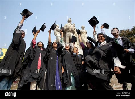 group  graduates gather    convocation   students