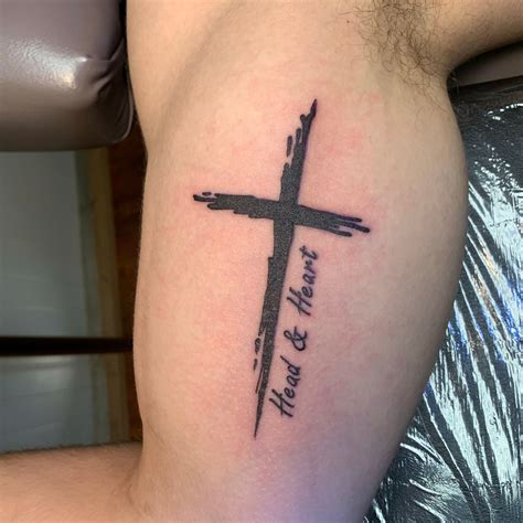 Cross Tattoo Inside Bicep