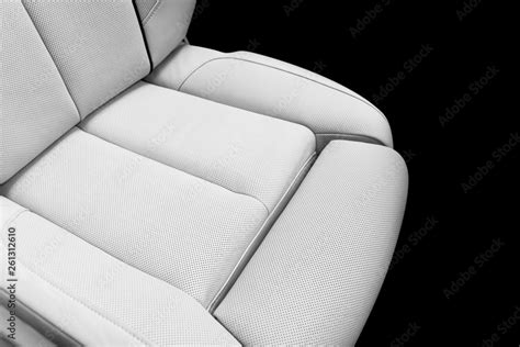 White leather interior of the luxury modern car. Perforated white ...