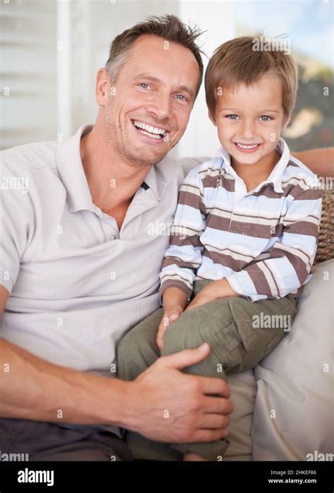 sharing  father son time portrait   father  son sitting