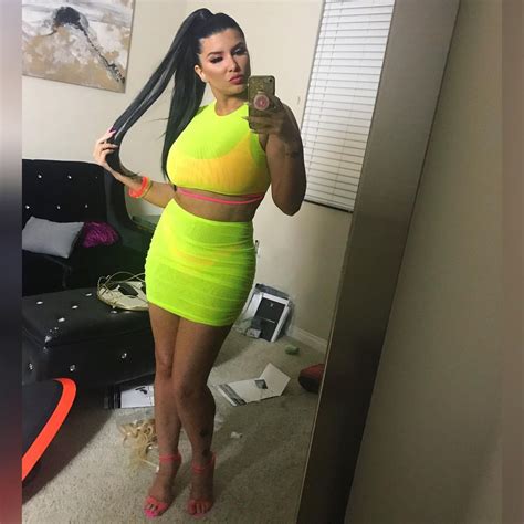 romi rain dazzles  tight dress pics