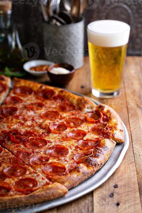 Large pepperoni pizza 16212539 Stock Photo at Vecteezy