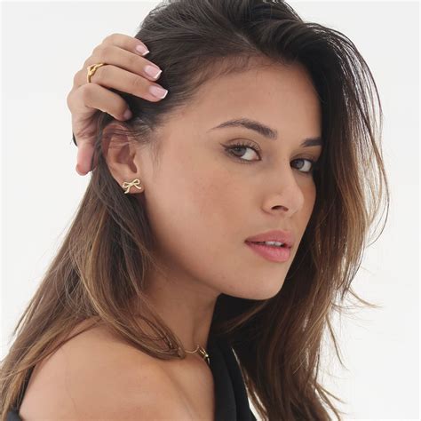 gold bow stud earrings kilkenny design