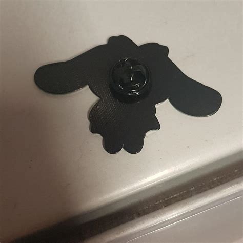 Cinnamoroll Goth type pin. Perfect on a lanyard or... - Depop