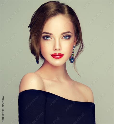 Beautiful model girl with elegant hairstyle . Woman with fashion style ...