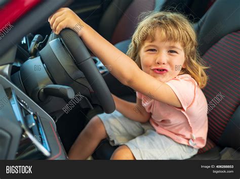 child kid driver image photo  trial bigstock