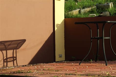 Shadow looks like it's cast by a light coming from below the table