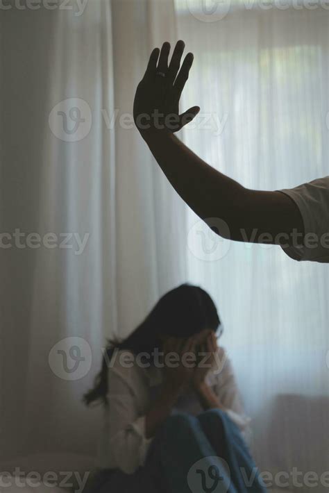 Upset woman having a fight with a man at home. Hispanic wife slapping
