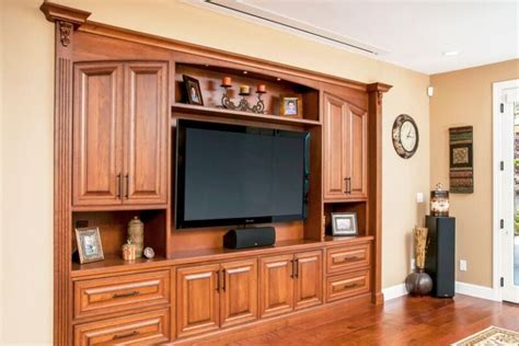 Entertainment Center Cabinetry with a Mid Brown Finish - Crystal Cabinets