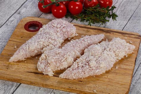 Raw chicken cutlet 12270187 Stock Photo at Vecteezy