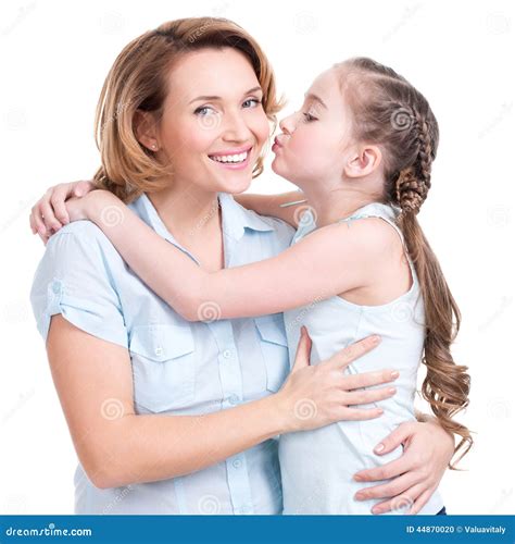 Young Daughter Kissing Mother Stock Photo - Image of love, family: 44870020