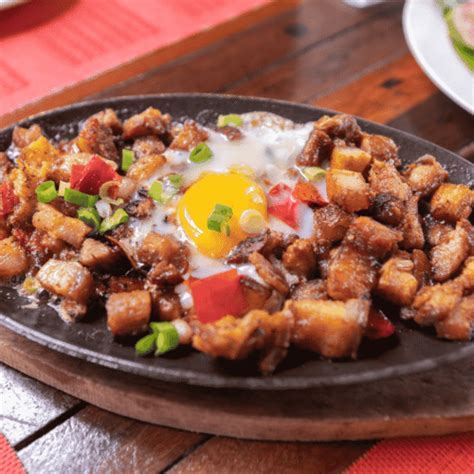 filipino sisig sizzling pork delishglobe