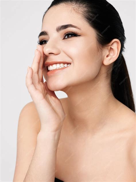 Premium Photo | Cheerful pretty brunette naked shoulders emotions hand