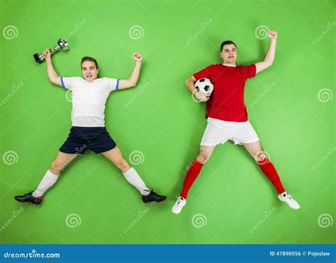 Celebrating Football Players Stock Photo - Image of soccer, trophy ...