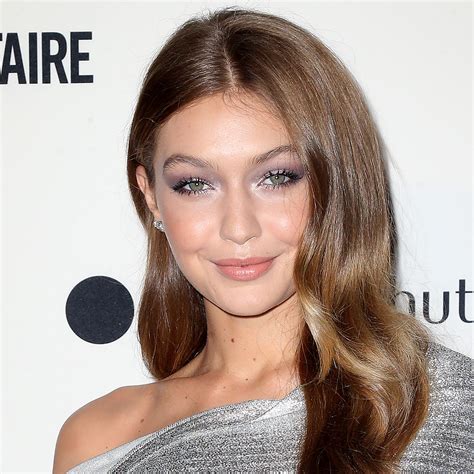 Gigi Hadid Dons A Chic Knit Coat And Birkin Bag For Date Night With ...