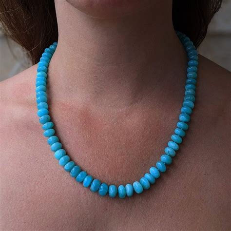 This necklace features the vivid blue-green gem Amazonite, polished to ...