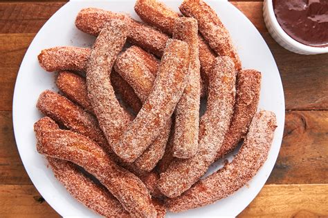 delicious churros coated  cinnamon sugar