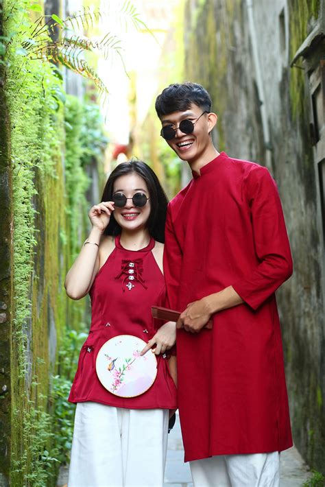 Stylish Vietnamese Couple in Traditional Attire · Free Stock Photo