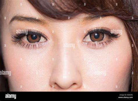 Portrait of woman with brown eyes close up Stock Photo - Alamy