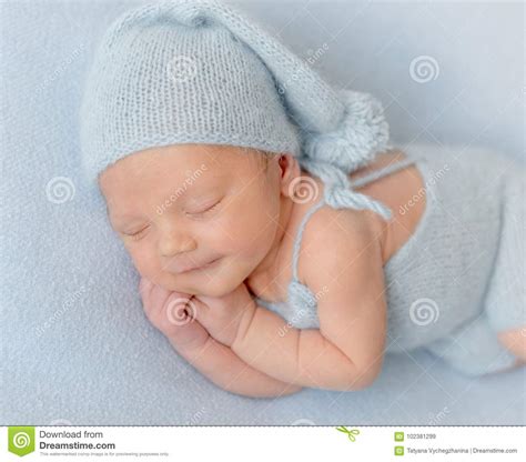 Smiling Newborn Baby Boy Sleeping Peacefully. Stock Image - Image of ...