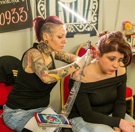 girls with stretched ears 3 | Flickr