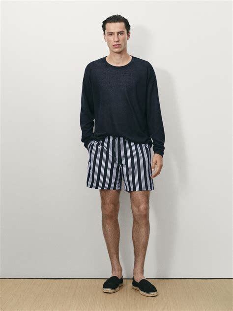 blue and white striped swimming costume 3