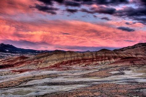 Sunset over the Painted Hills | Painted hills, Sunset, Natural landmarks