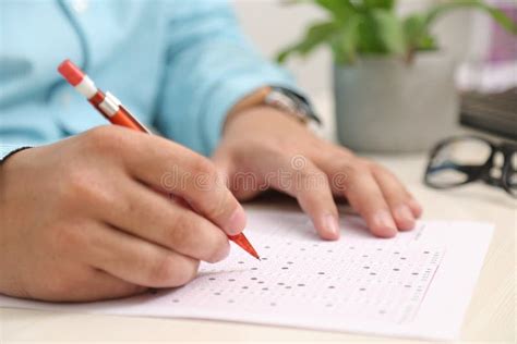 man  filling omr sheet   stock image image  education