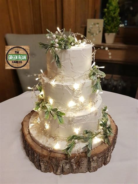 Rustic fairylight wedding cake | Winter wedding cake, Simple wedding ...