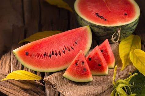 premium photo watermelon slice   rustic wood background