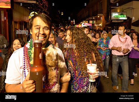 bourbon street mardi gras new orleans Stock Photo - Alamy