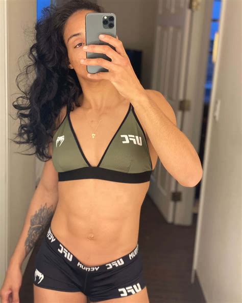 Download Taila Santos Taking Selfie In Mirror Wallpaper | Wallpapers.com