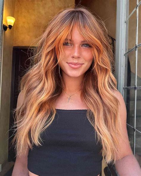 Subtle copper tones will dominate the trends for fall hair highlights 3