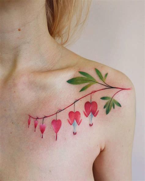 Watercolor style bleeding heart flower tattoo done on