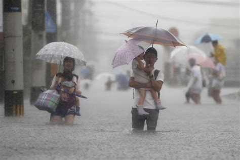 Heavy rain causes floods, mudslides in southwestern Japan | AP News