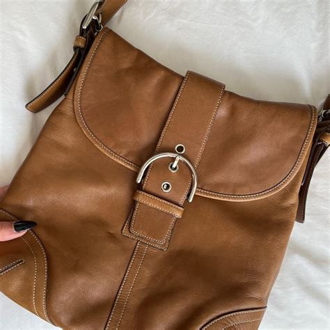 brown coach crossbody bag great condition, light... - Depop