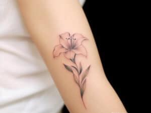 The Significance of Lily Tattoo Meanings + Designs