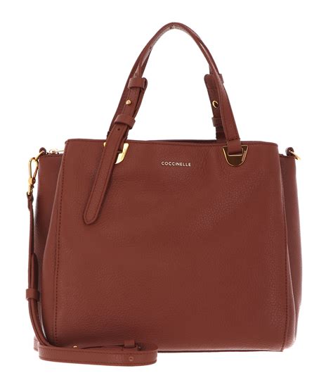 Unpacking the Enigmatic World of Lea and Simmons: Their Rise to Handbag Supremacy 3