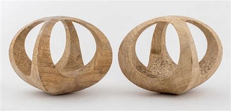 Pair of Abstract Carved Volcanic Rock Sculptures sold at auction on ...