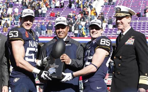 Navy Midshipmen unveil new Under Armour football uniforms for 2014