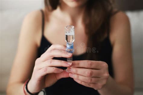 Woman Filling Up the Reservoir of Her Insulin Pump with Insulin Stock ...