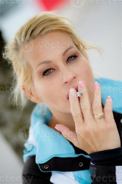 Pretty woman smoking 15449236 Stock Photo at Vecteezy
